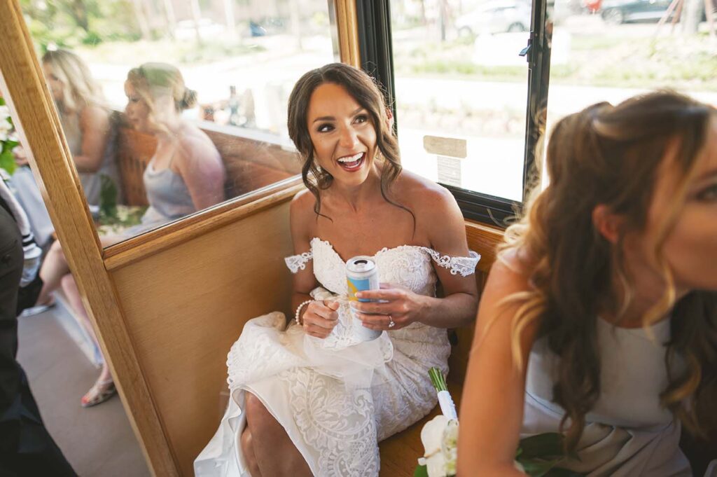 Bride and bridesmaids on a wedding bus.